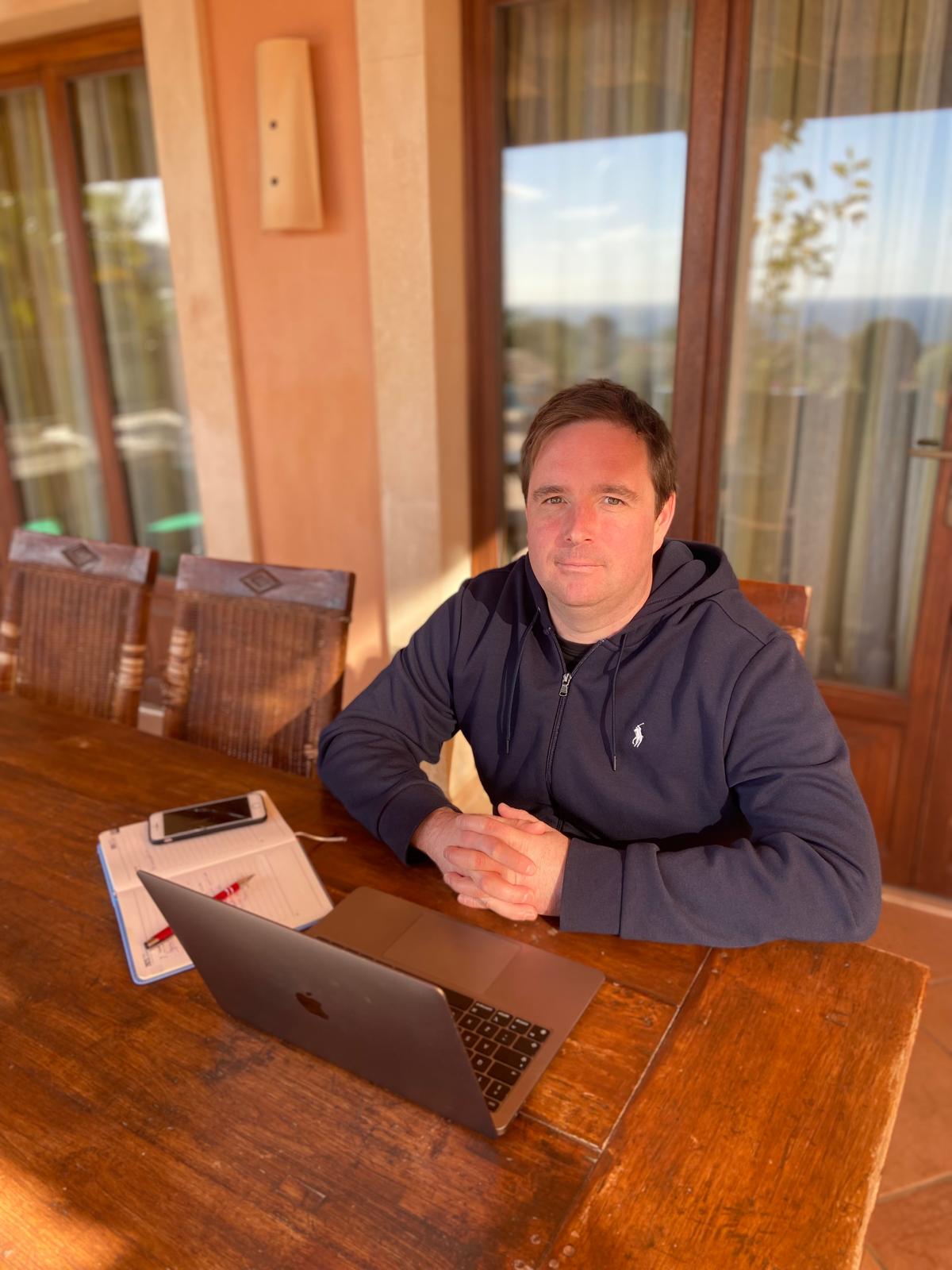 Vincent, The Self Employed Coach, working at his desk